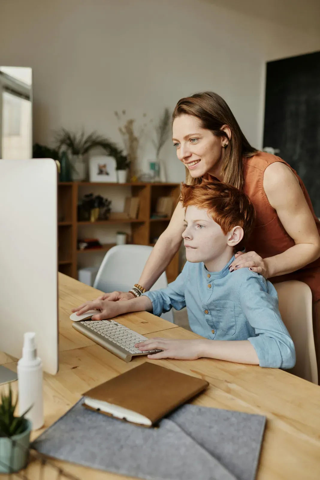 Child working on schoolwork with focused attention